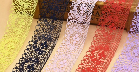 What diverse lace designs are used in both fashion and home decor?
